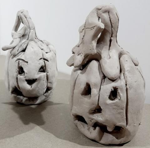 gray clay pumpkins