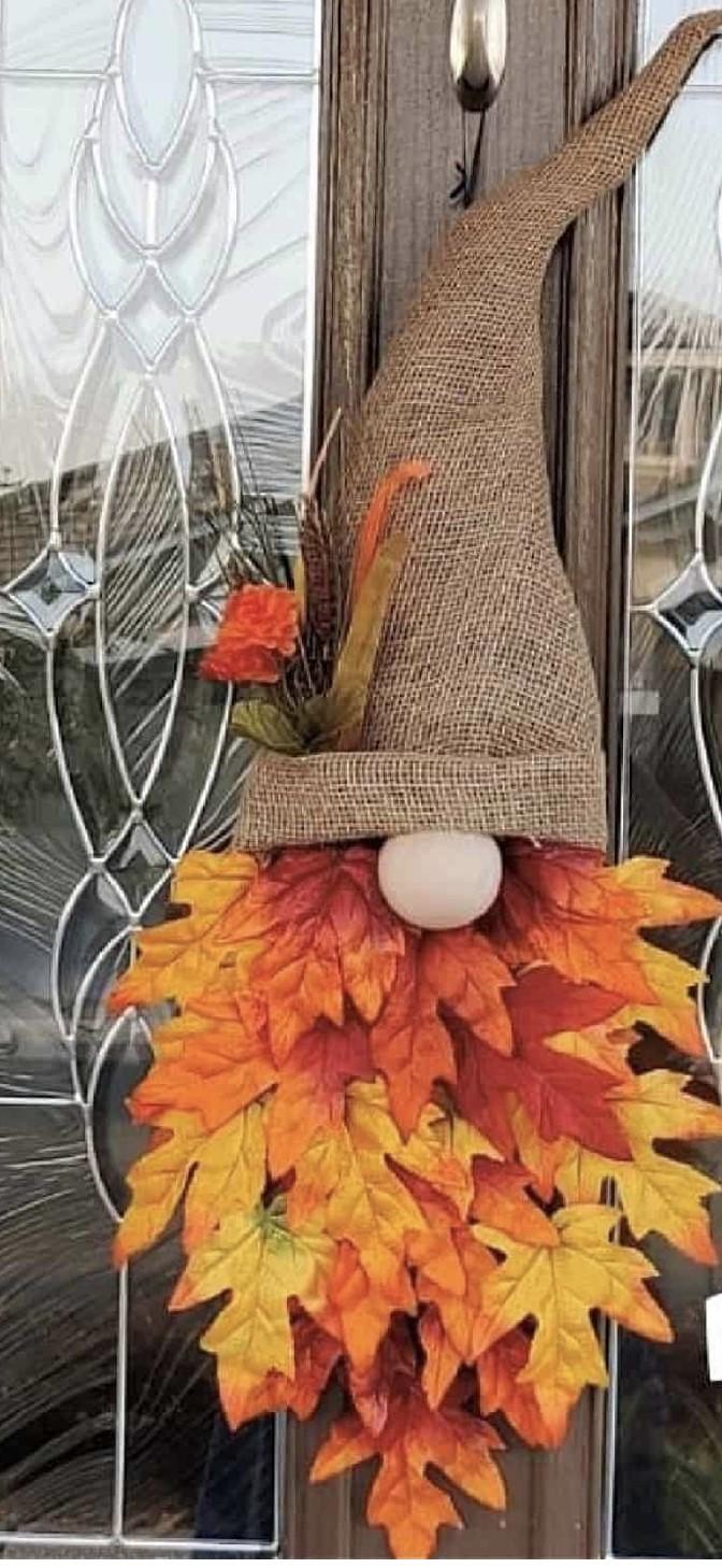 gnome with brown hat and orange and yellow leaf beard