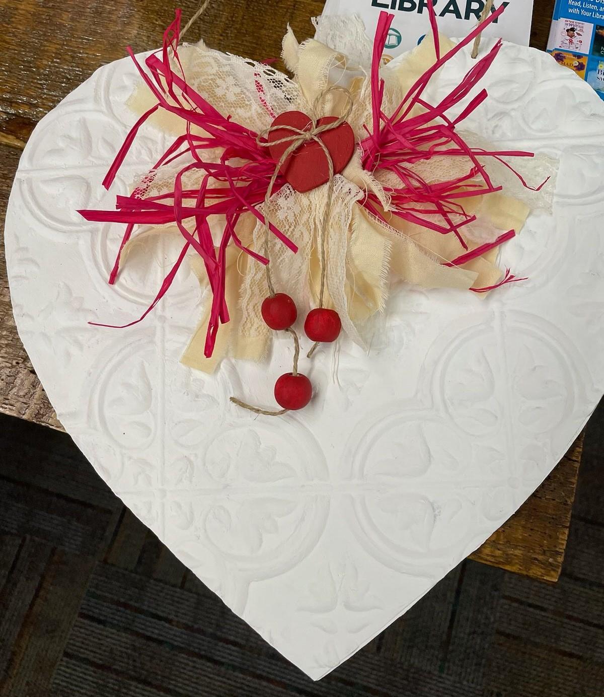 White Valentine Heart with red ribbon