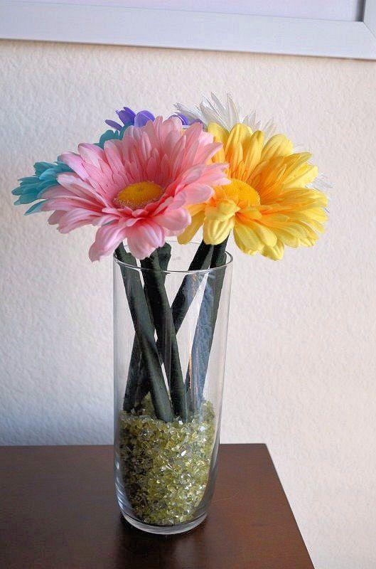 multi colored flowers with green pen