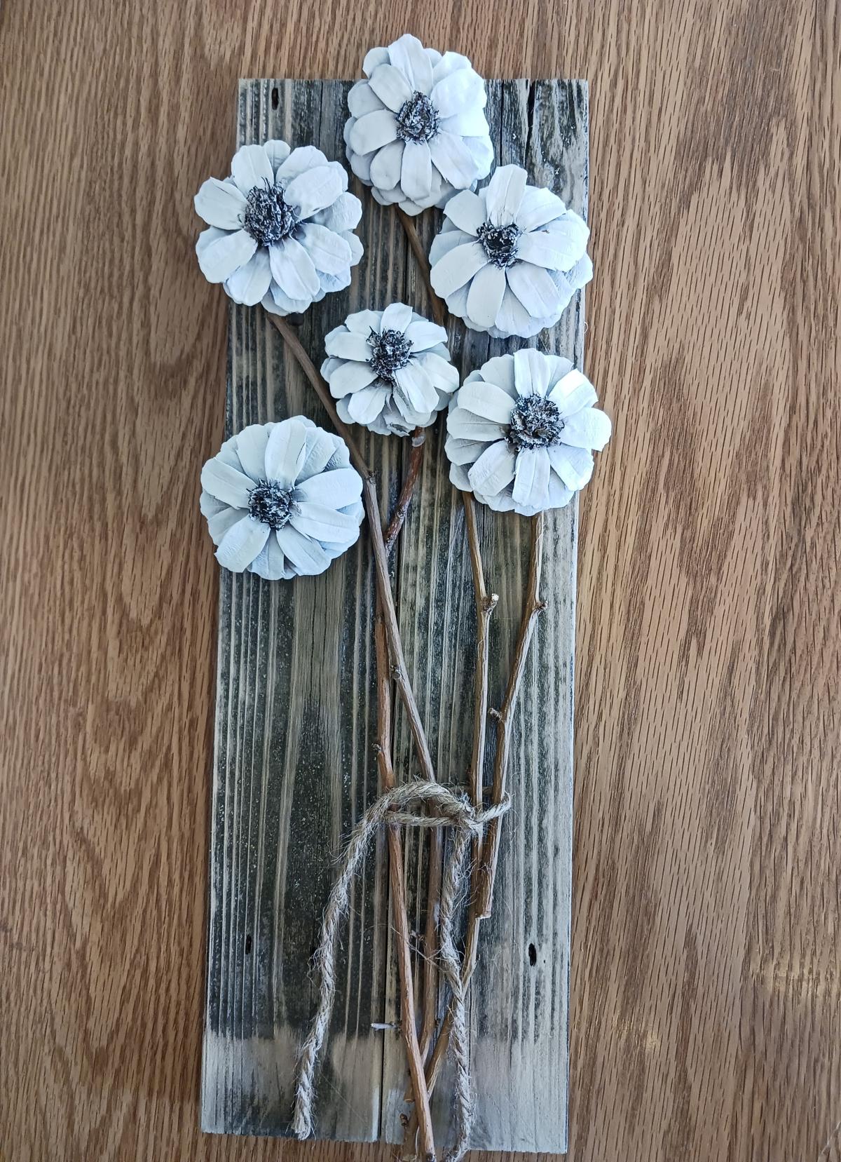 grey background, white flowers